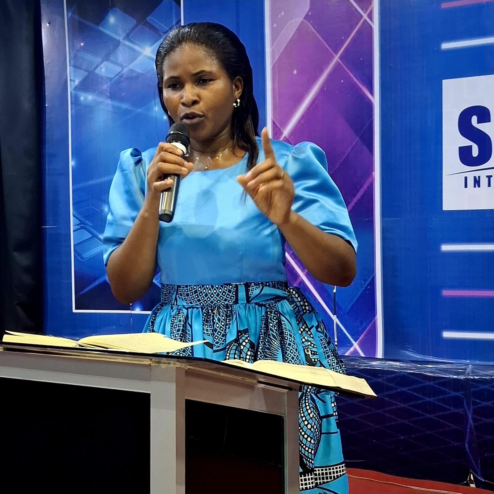 Mrs A. E. Stanley teaching from the pulpit.