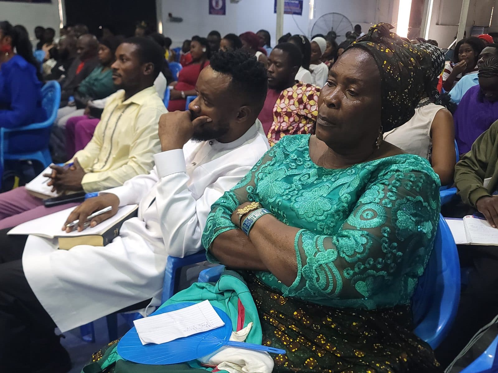Believers attentive to the Word during service.