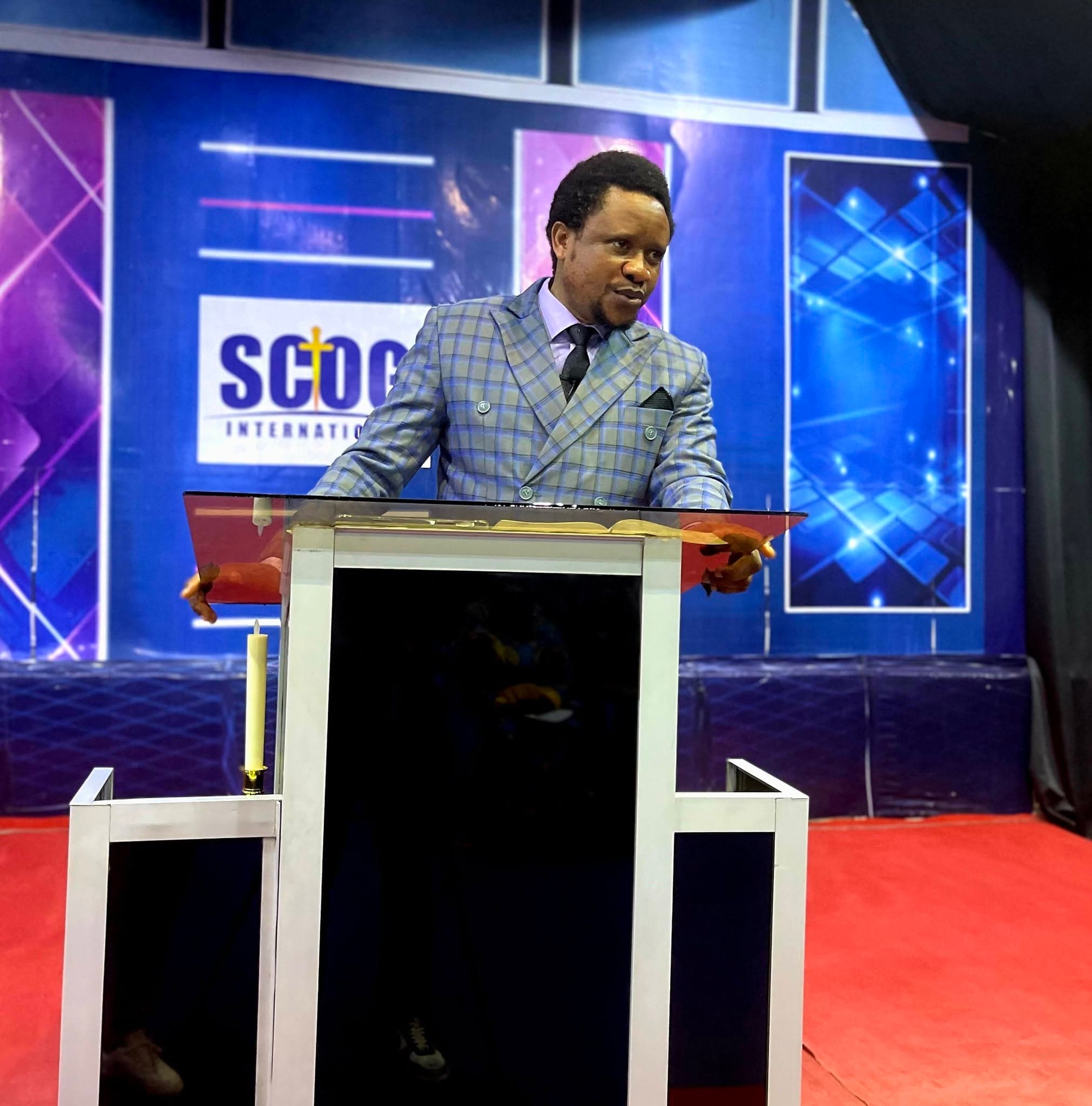 Apostle A. E. Stanley preaching